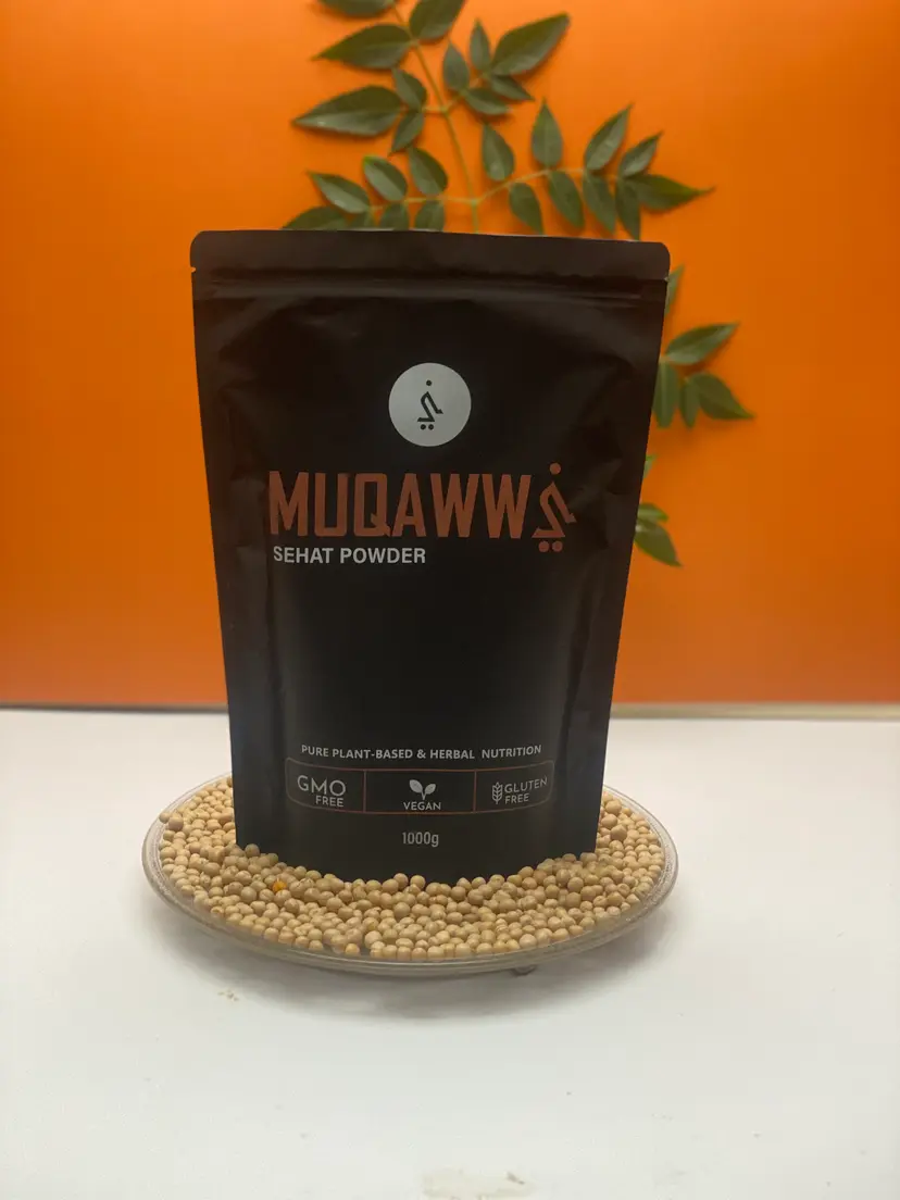 Muqawwi pouch with green leaves on an orange wall